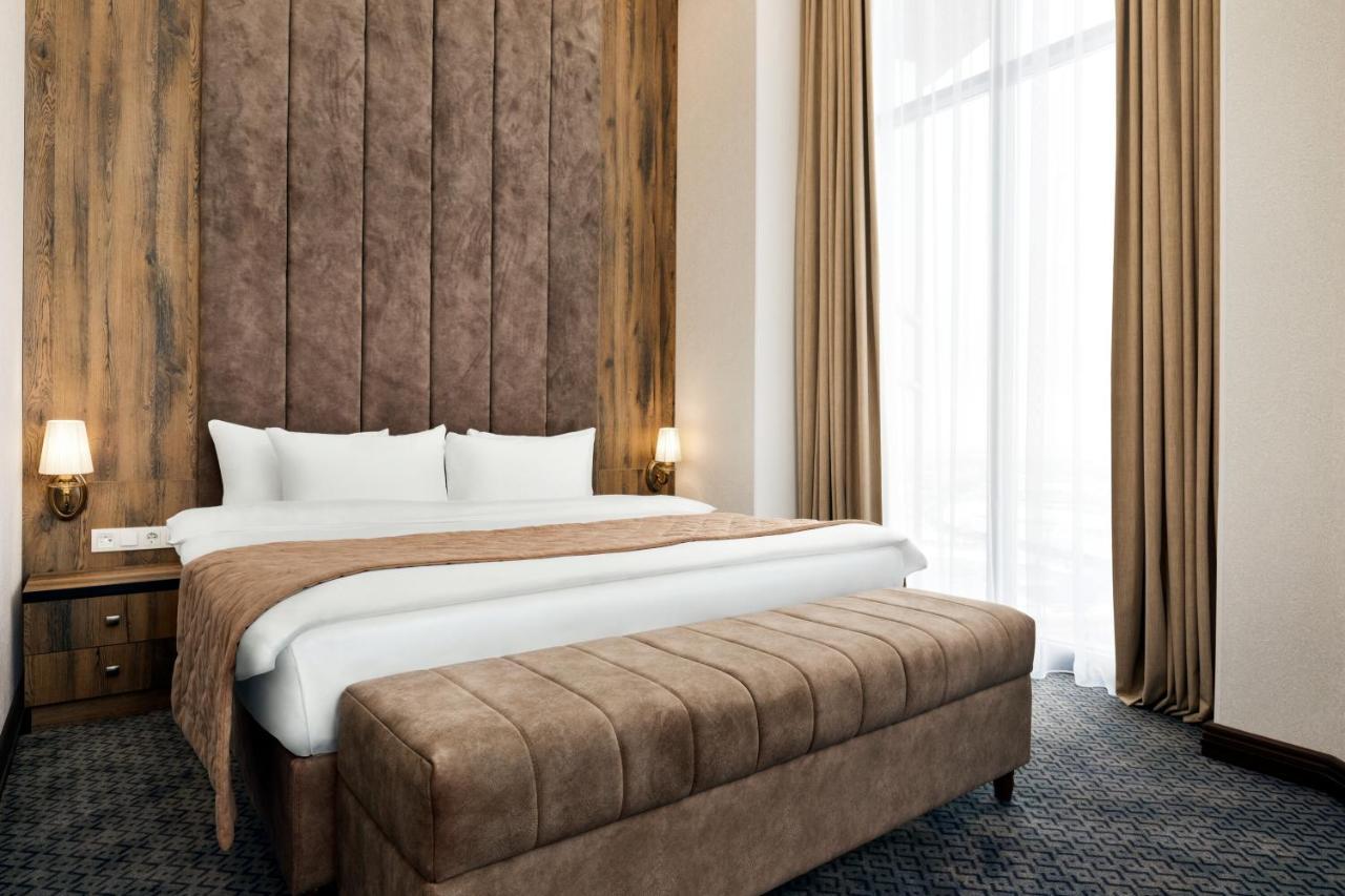 Ramada By Wyndham Shymkent Hotel ภายนอก รูปภาพ