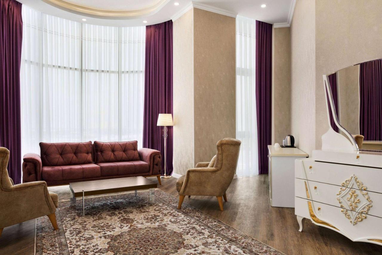 Ramada By Wyndham Shymkent Hotel ภายนอก รูปภาพ